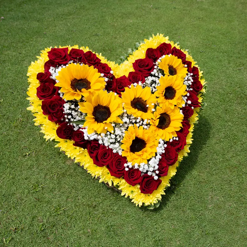 Corazon con girasoles, arreglo floral en forma de corazón